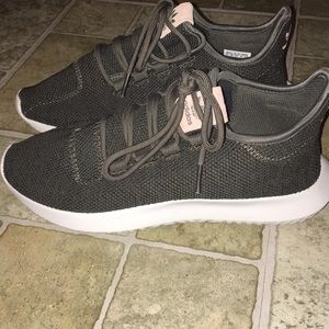 Adidas sneakers new, only worn one time. No flaws.